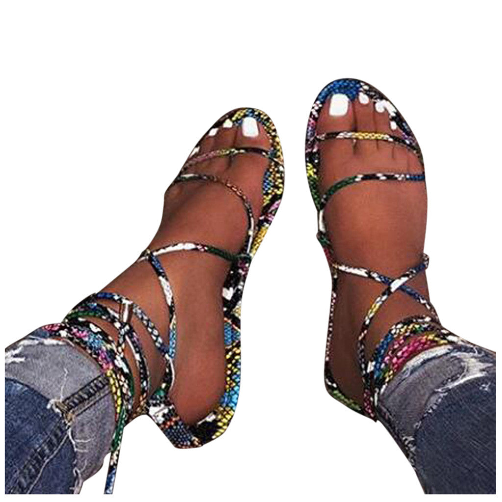 Fashionable snake strap sandals