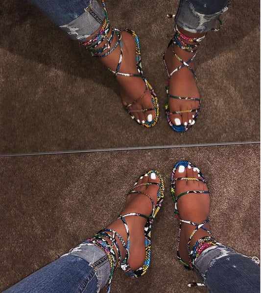 Fashionable snake strap sandals