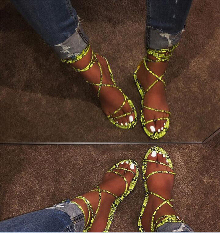 Fashionable snake strap sandals